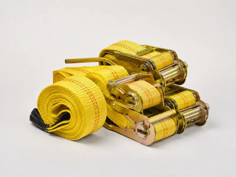 Tie-down straps with ratchet in studio product photo